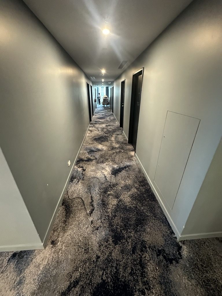 Hotel corridor with marbled patterned carpet