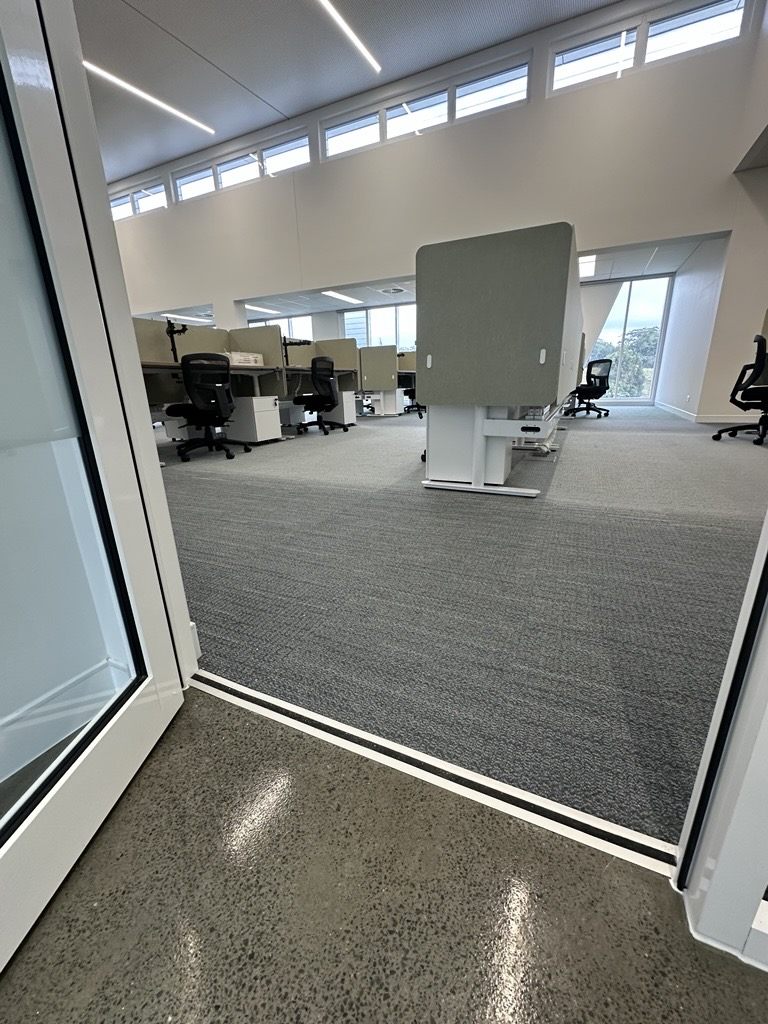 Open-plan workspace with commercial carpet tiles