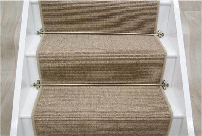 Sisal stair runner with traditional rods
