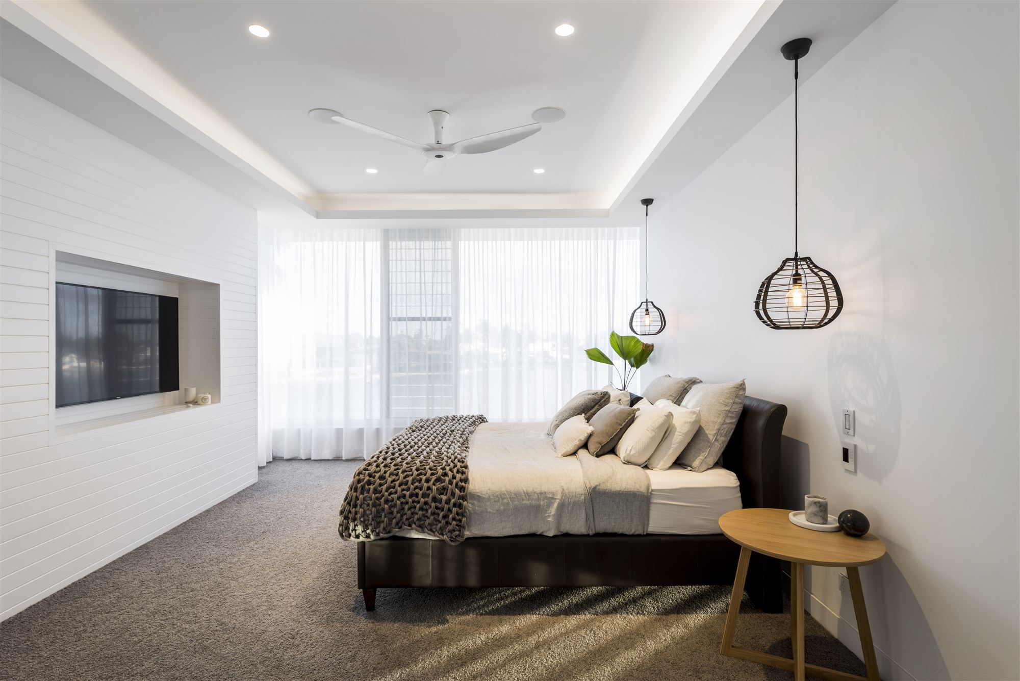 Master bedroom with soft wool carpet installed by Cross Carpets