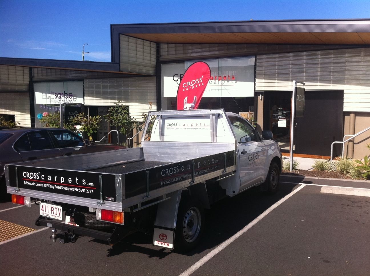 Cross Carpets at the Brickworks Centre, 107 Ferry Road Southport, with the branded ute out front